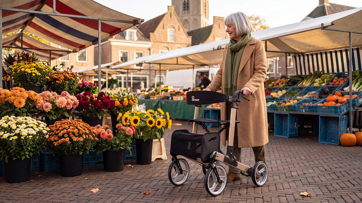 Parvum Luxo in champagne at a Saturday market; a woman with gray hair walks with the rollator past the stalls.
